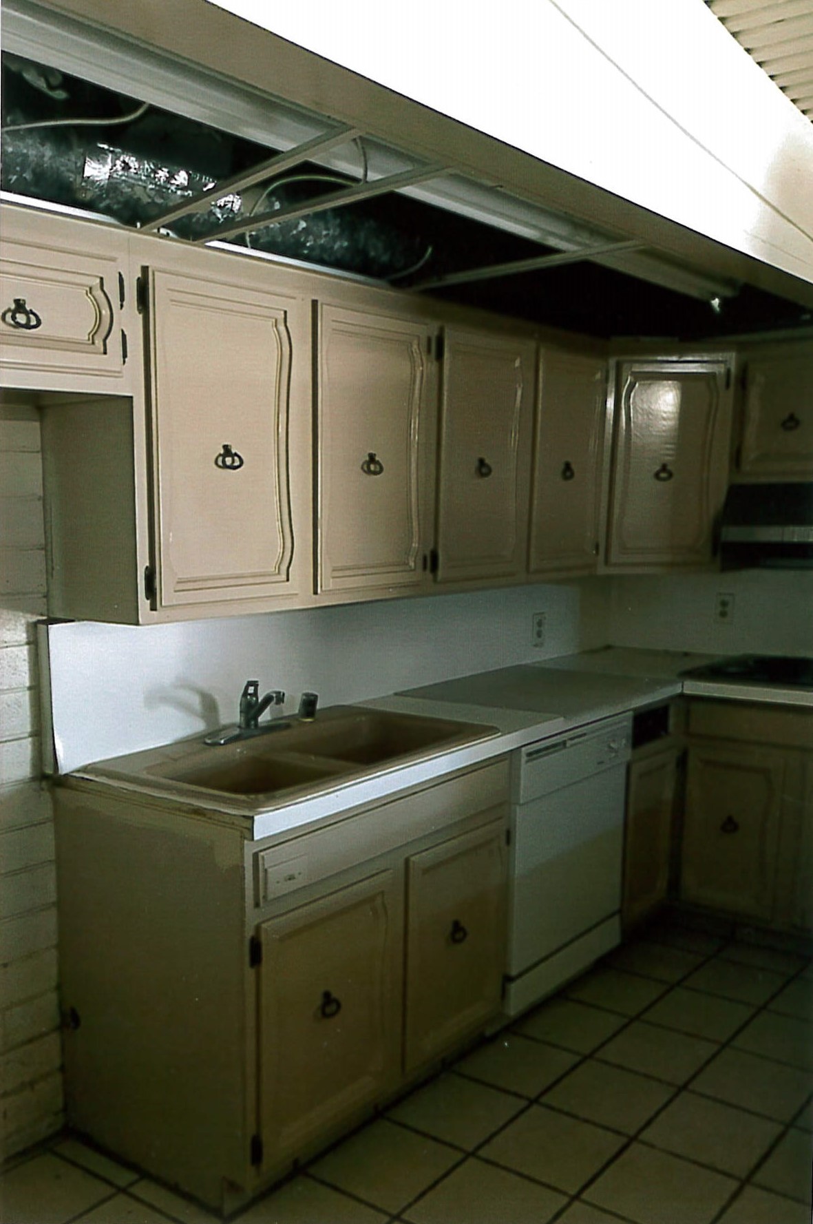 Kitchen showing non-original cabinetry